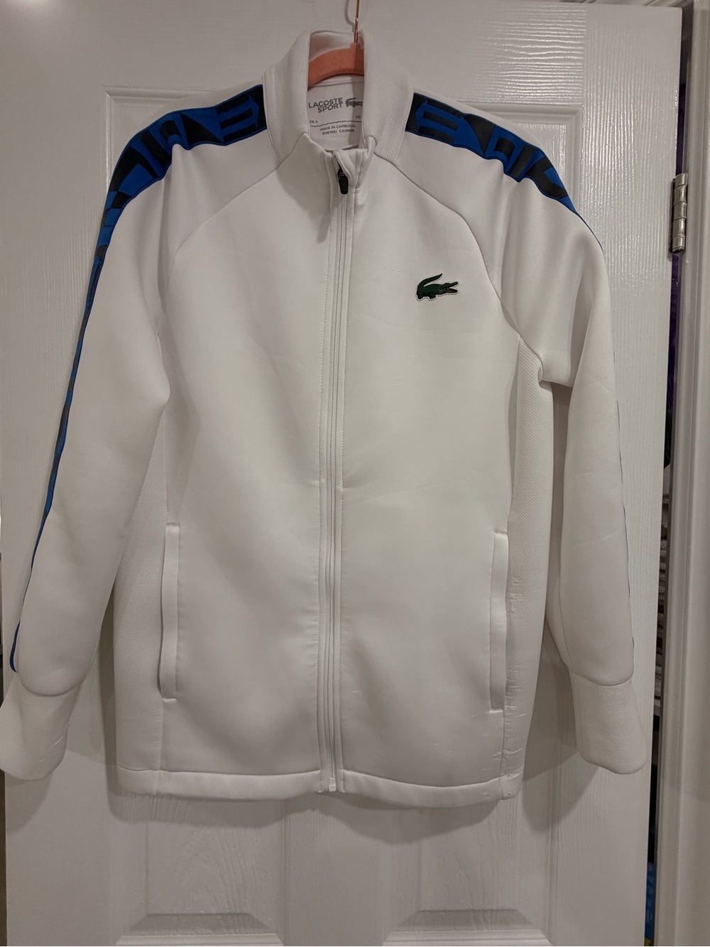 Lacoste Kids White Jacket with Blue Shoulder Stripes